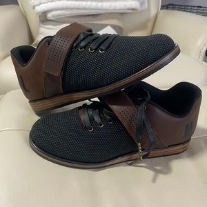 Brand new. Never worn. Size 7 NoBull lifters